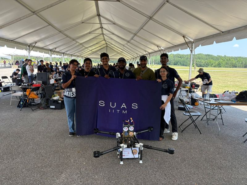 The full team behind the 2025 UAV at the competition tent