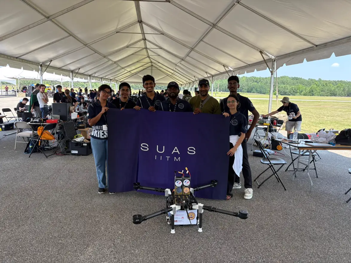 The full team behind the 2025 UAV at the SUAS 2025 competition tent